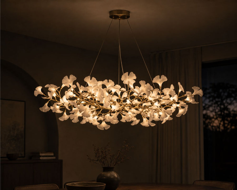 The chandelier glowing warm