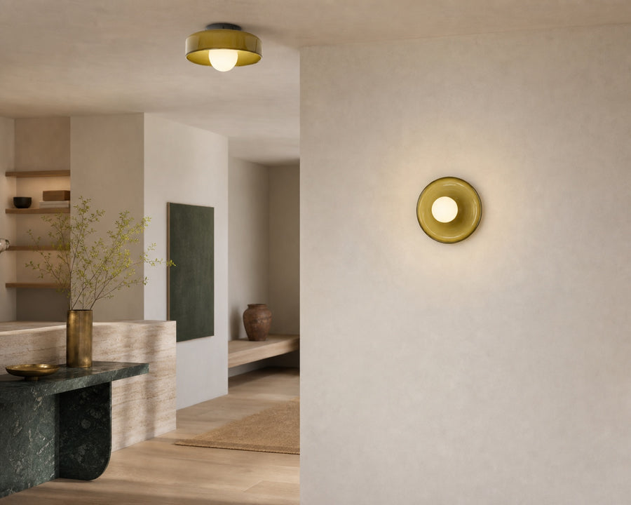 The light shown flush on a ceiling and on a wall
