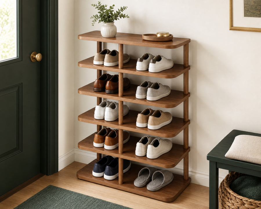 The rack full of neatly lined-up shoes in an entryway