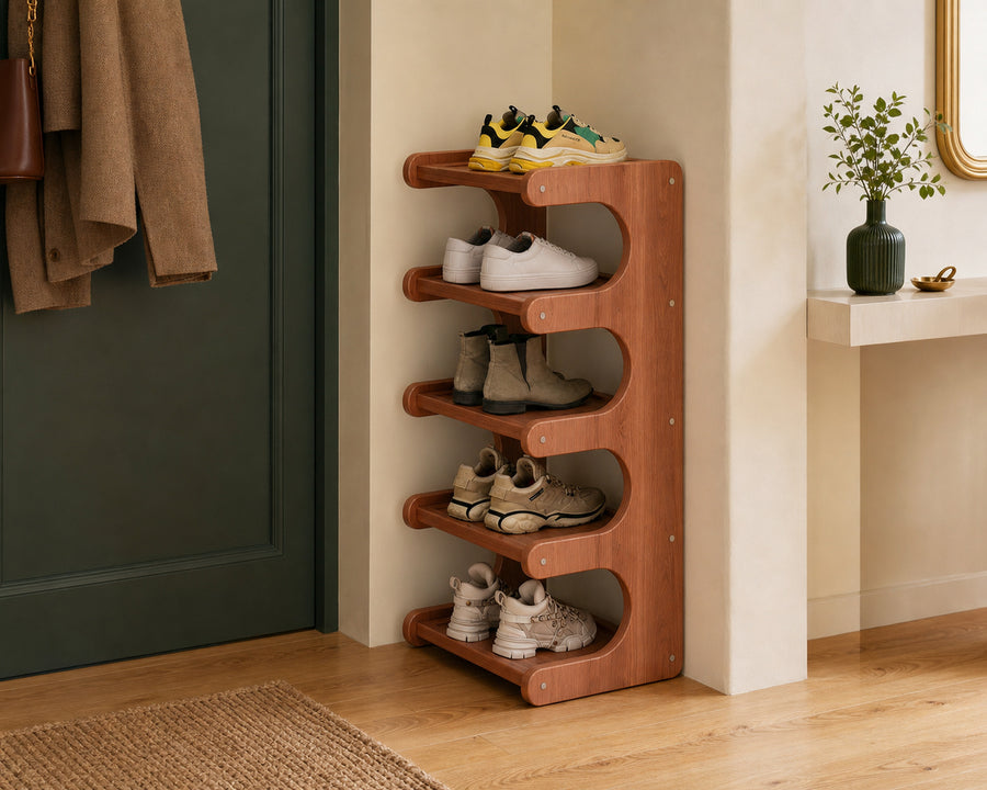 The slim bamboo shoe rack in a narrow entryway