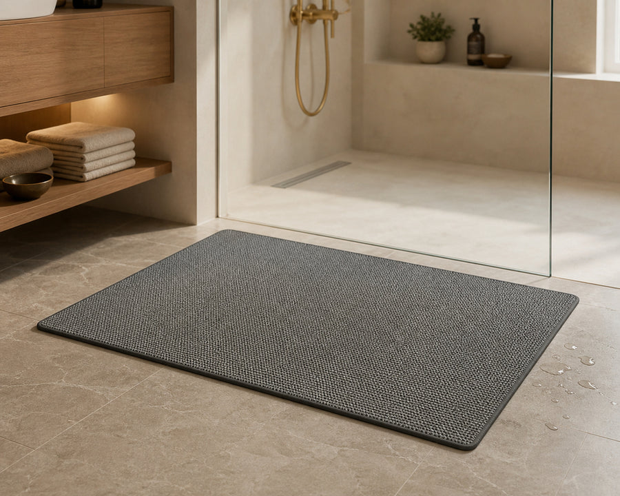 The mat in front of a shower, soaking up water