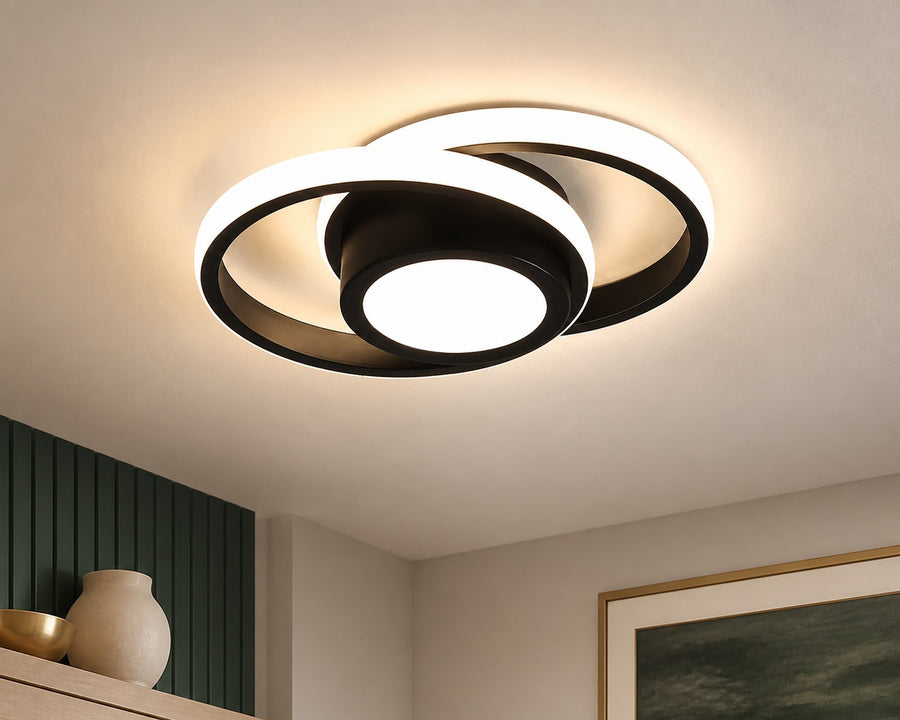 The double ring lit on a ceiling, seen from below