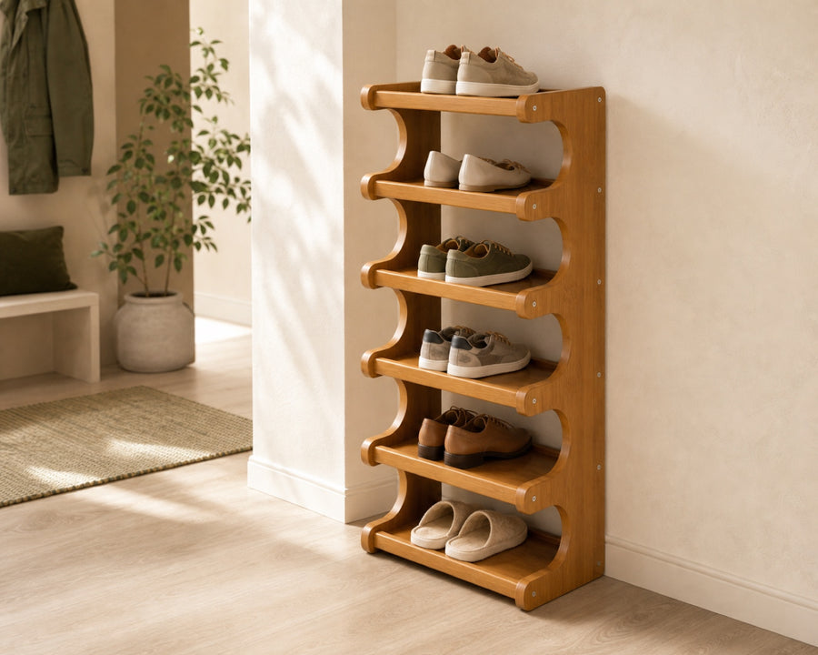 The slim tower rack full of shoes in an entryway