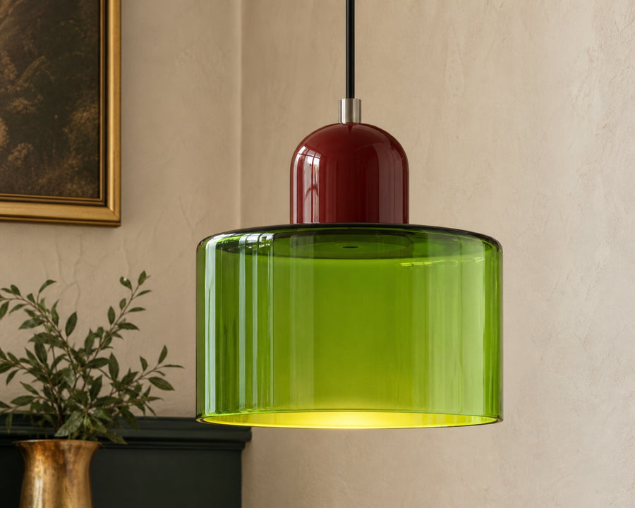 The coloured glass shade lit, showing its depth
