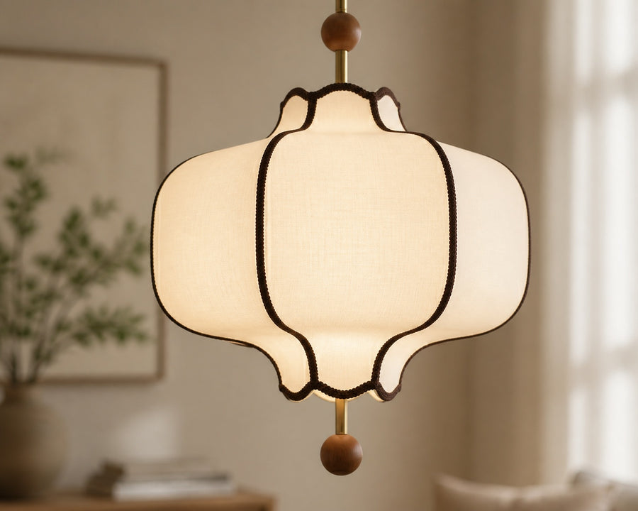 Close view of the scalloped fabric shade and trim
