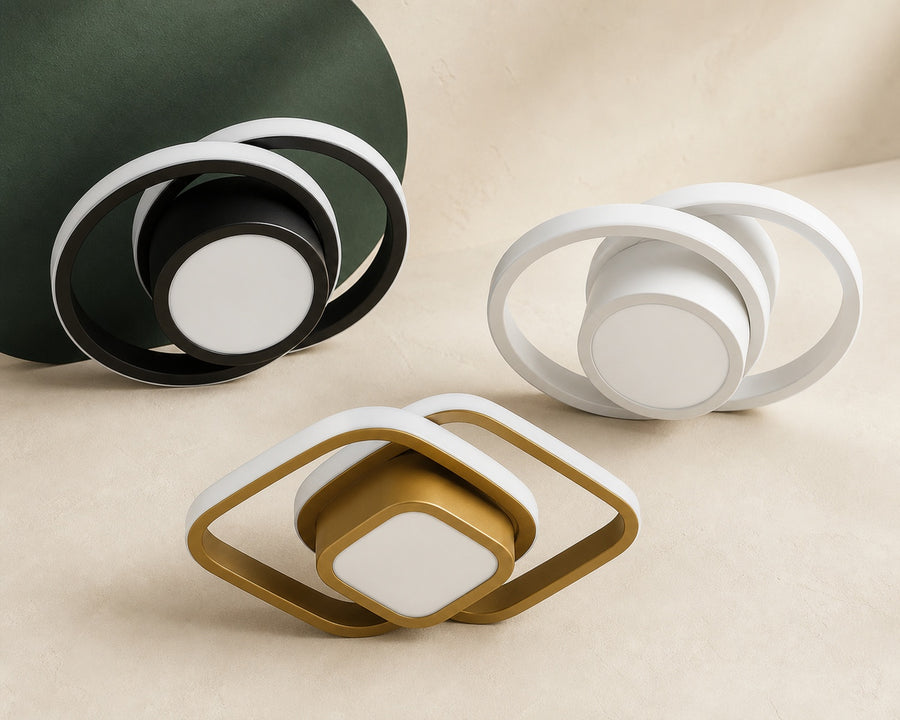 The fixture shown in black, white and gold finishes
