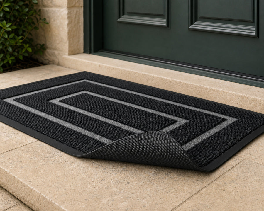 The non-slip rubber backing of the mat