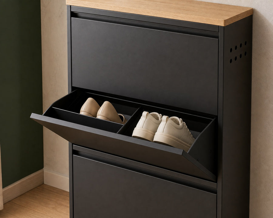 A flip drawer tipped open showing shoes on the angled shelf