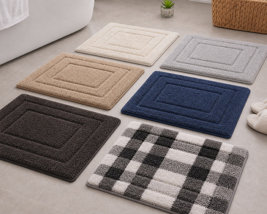 Several colours of the bath mat laid out together