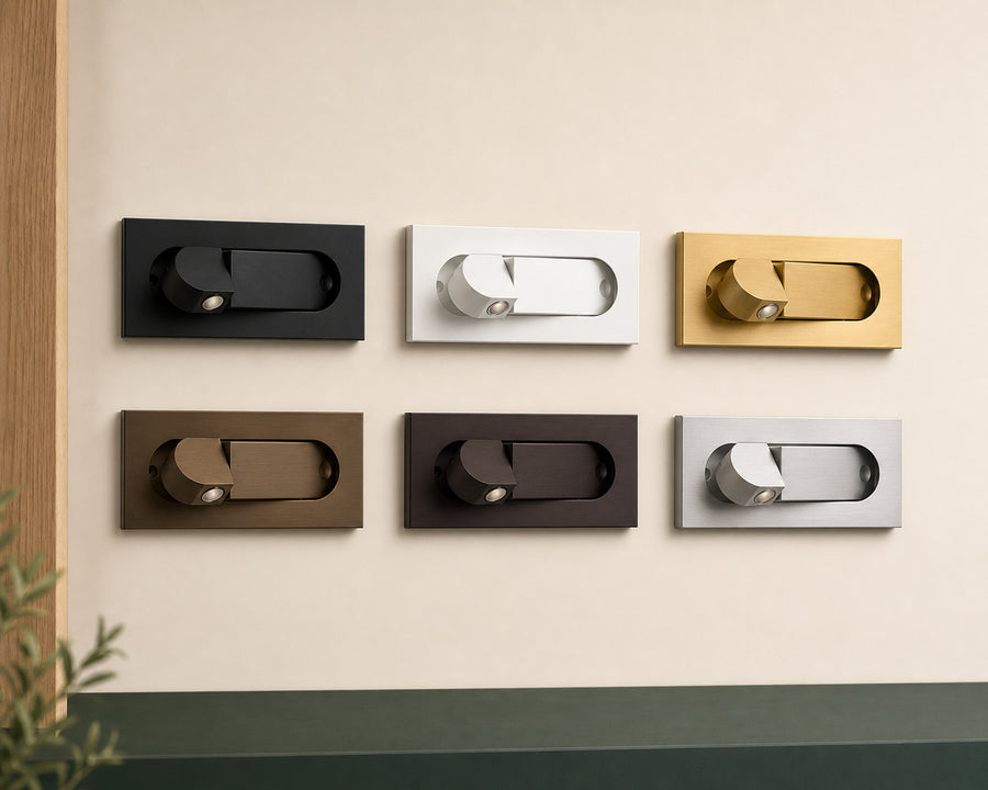 The sconce shown in its six finishes