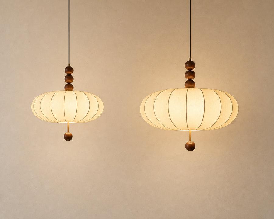 The two pendant sizes shown together