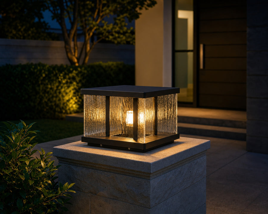 The pillar light glowing warm at night