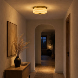 Art Deco Vintage Ceiling Light in a plaster hallway at dusk, warm glow