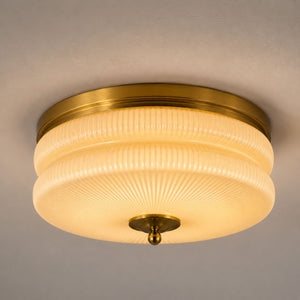 Flush-mount detail showing the fixture sitting tight to the ceiling