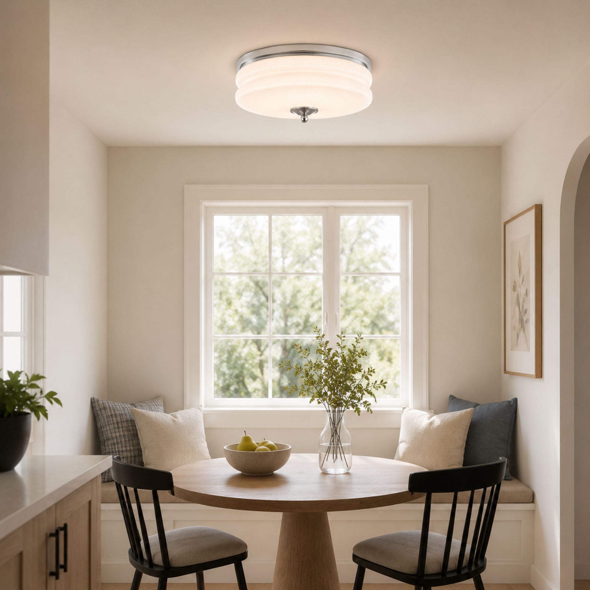 Large Chrome White fixture over a breakfast nook in morning light