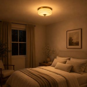 Small Gold Beige fixture glowing warm above a bedroom at night